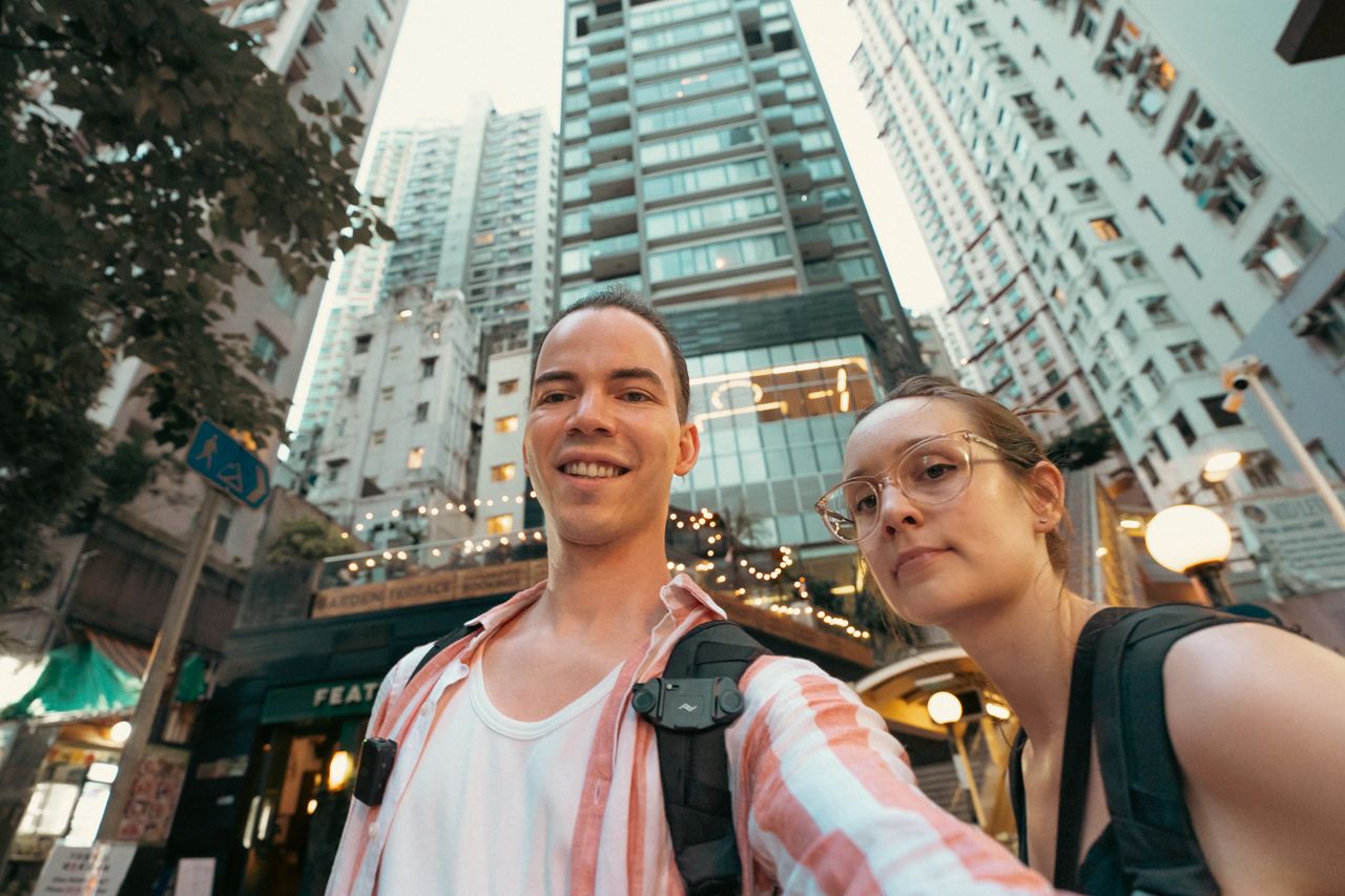 Couple smiling at Central-Mid-Levels escalator