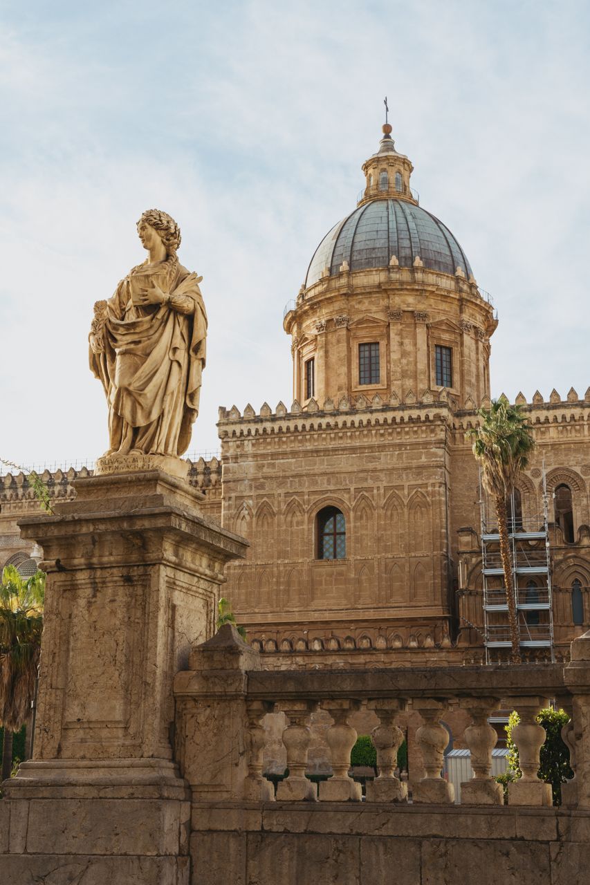 Palermo Cathedral front with statue sunny day
