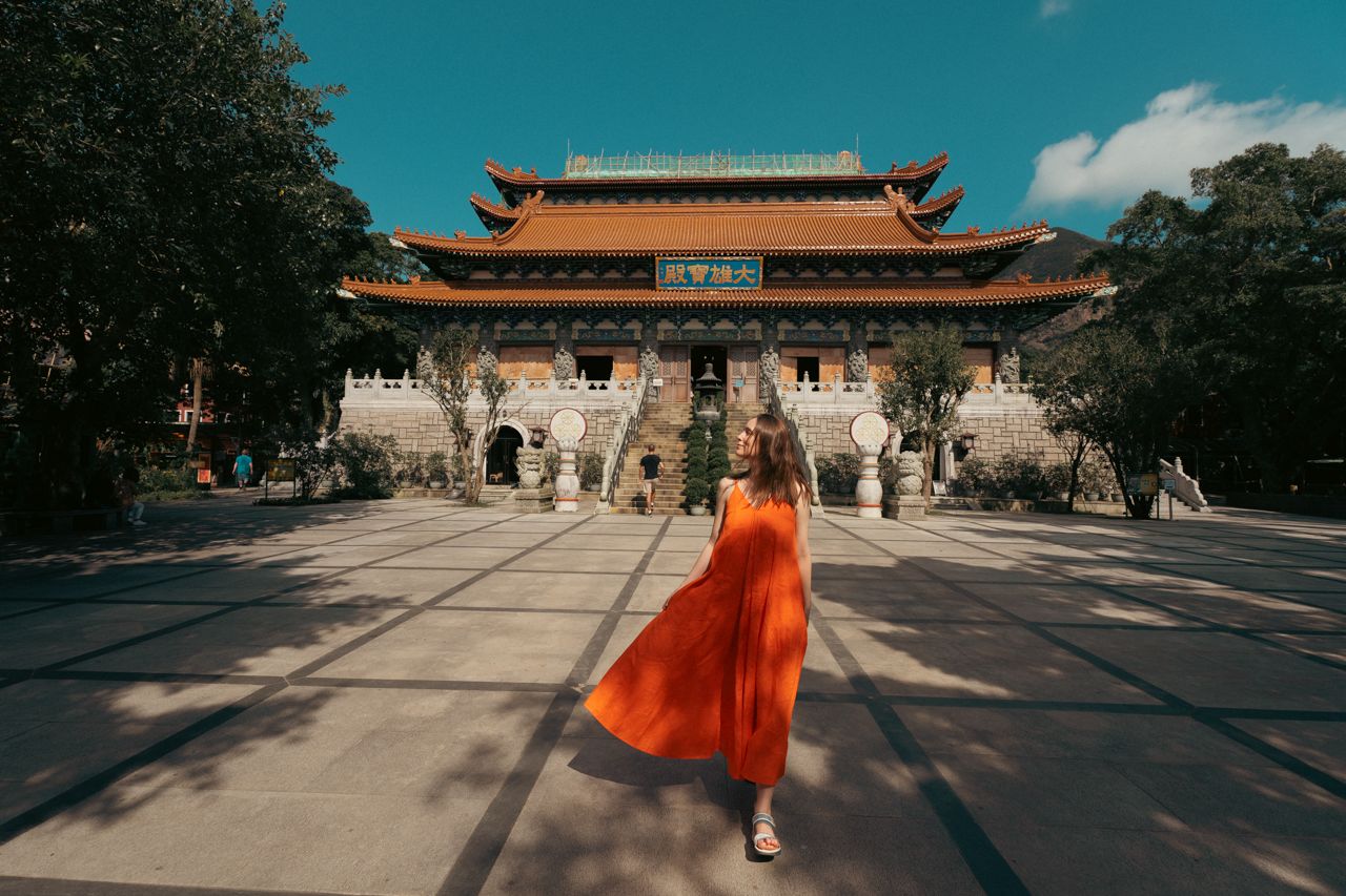 Woman smiling at Po Lin Monastery