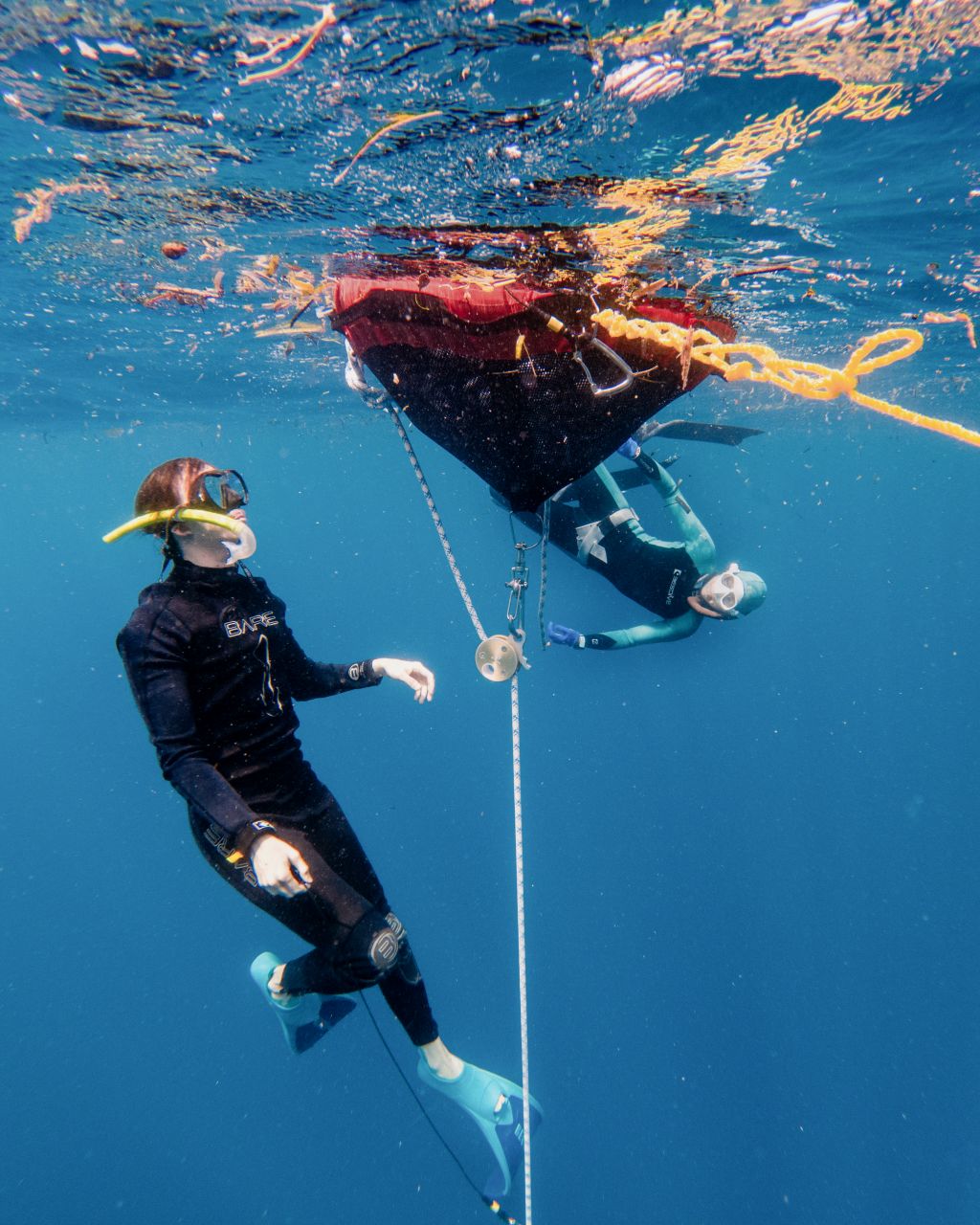 Man freediving in Moalboal, Cebu, Philippines.