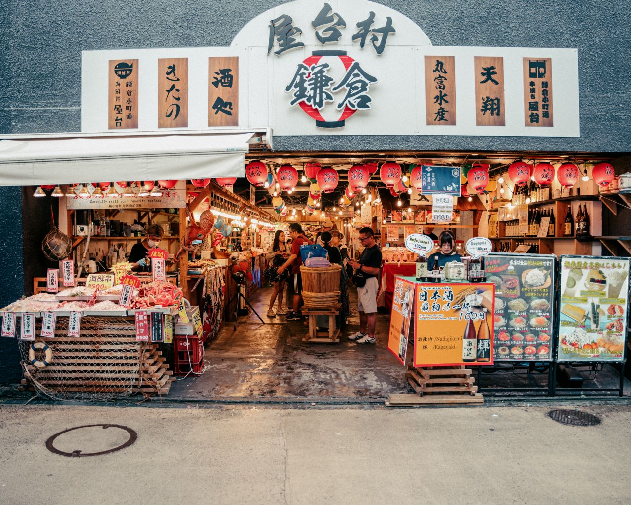 Seafood shop exterior in Komachi street, Kamakura, Japan.