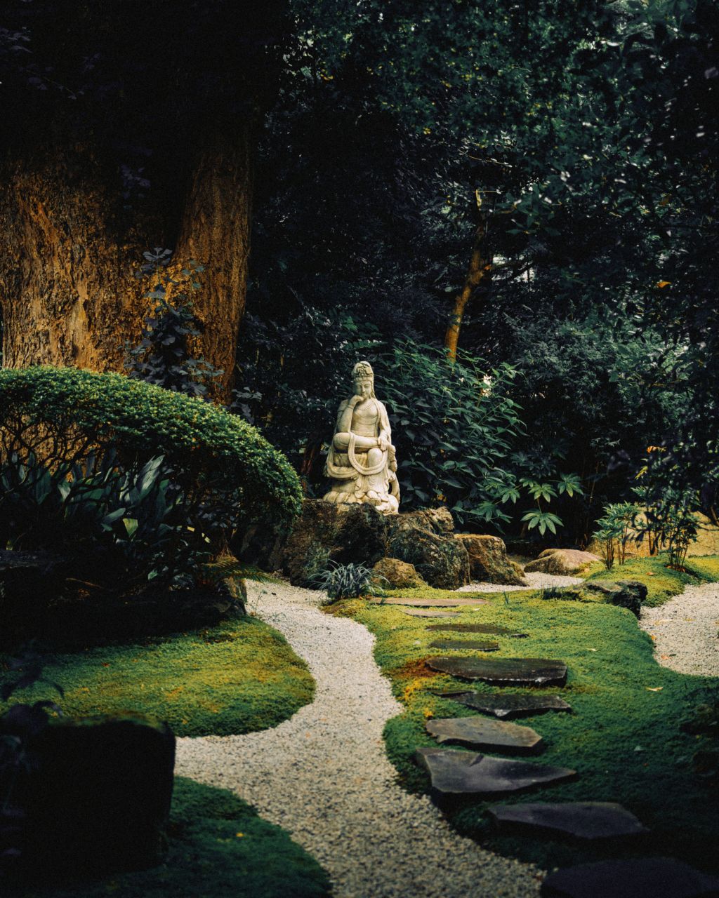 Statue of the Goddess of Mercy in the garden of Hokoku-ji Temple, Kamakura.
